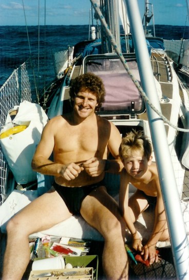 Father and son making lures