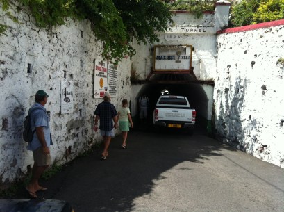 Pedestrians and cars squash in together